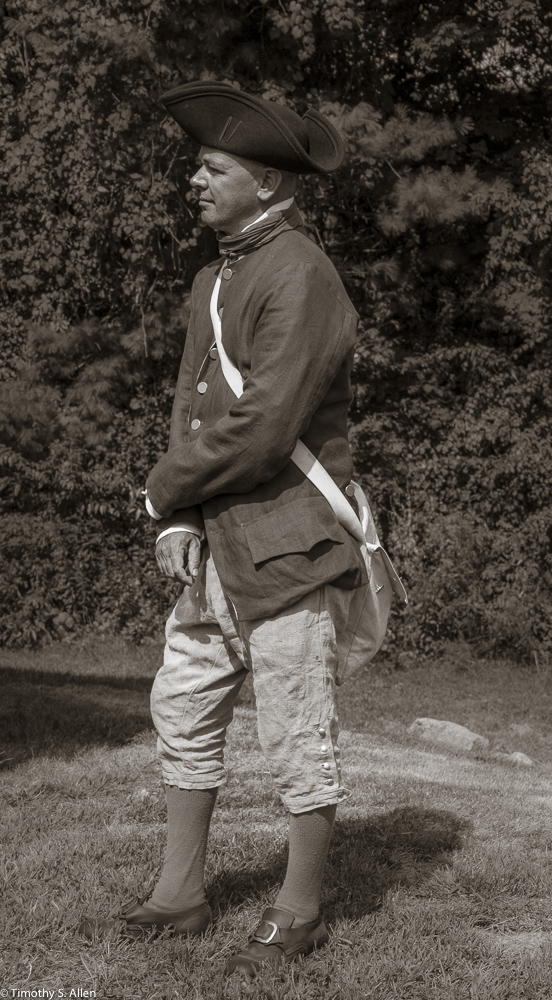 One of The Lincoln Minute Men volunteers dressed in 1775 period clothing at the Captain William Smith House, Lincoln, MA August 29, 2015