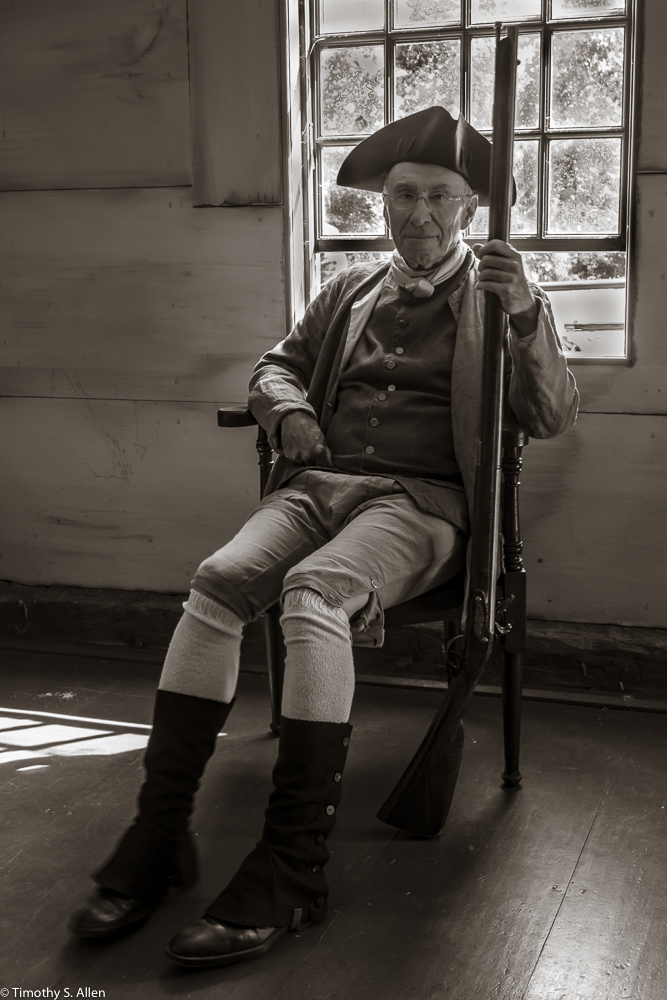 One of The Lincoln Minute Men volunteers dressed in 1775 period clothing at the Captain William Smith House, Lincoln, MA August 29, 2015