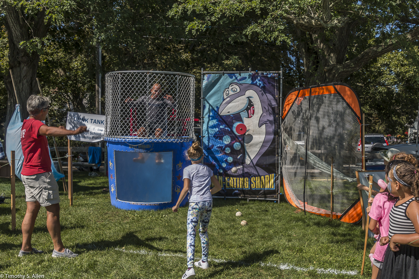 Elementary Student Successfully Hits the Target to Dunk Her Elementary Principal Eastham Windmill Weekend Eastham, MA, U.S.A. September 11, 2017