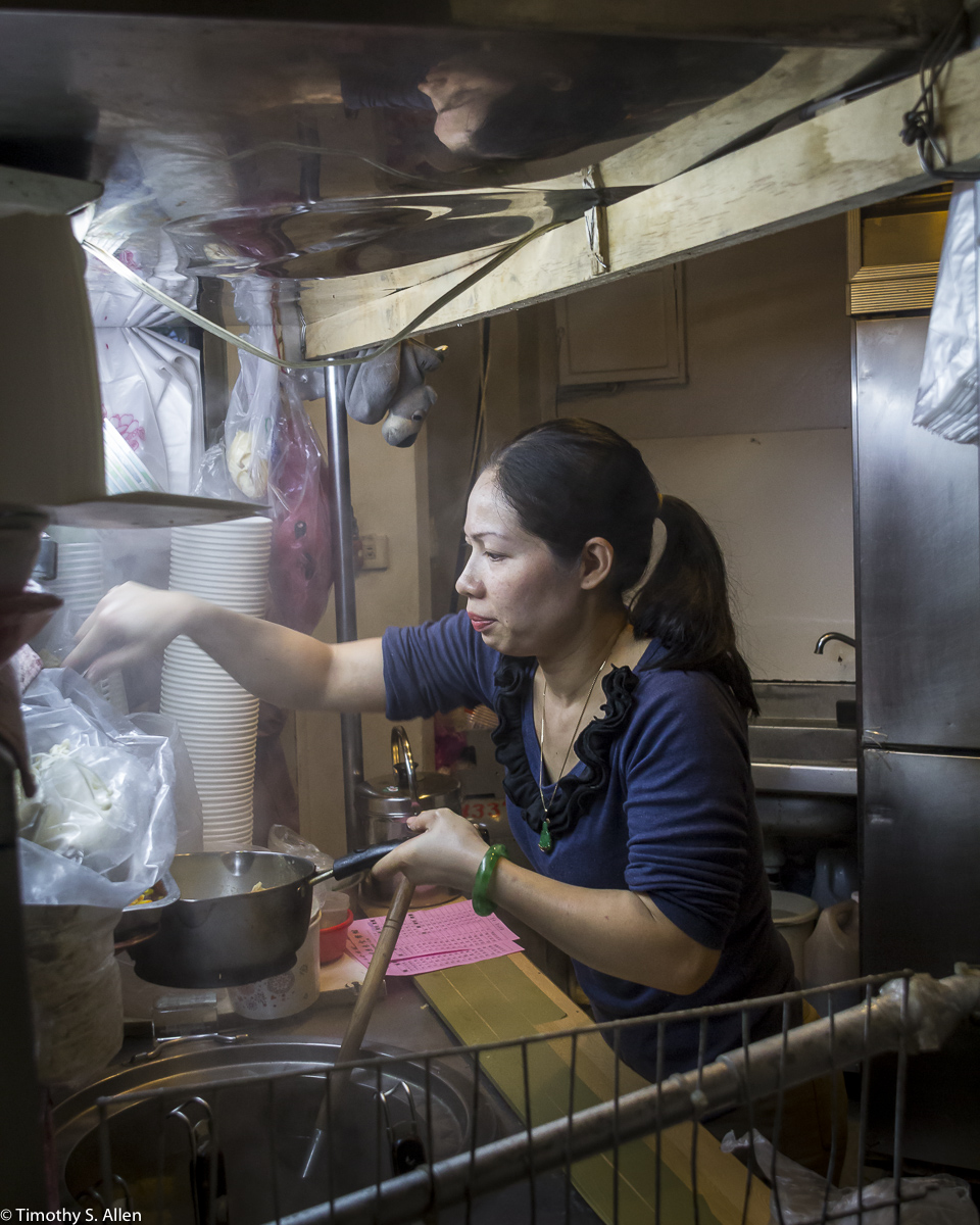 Preparing Noodle Dishes for Her Customers Taichung, Taiwan April 17 2014